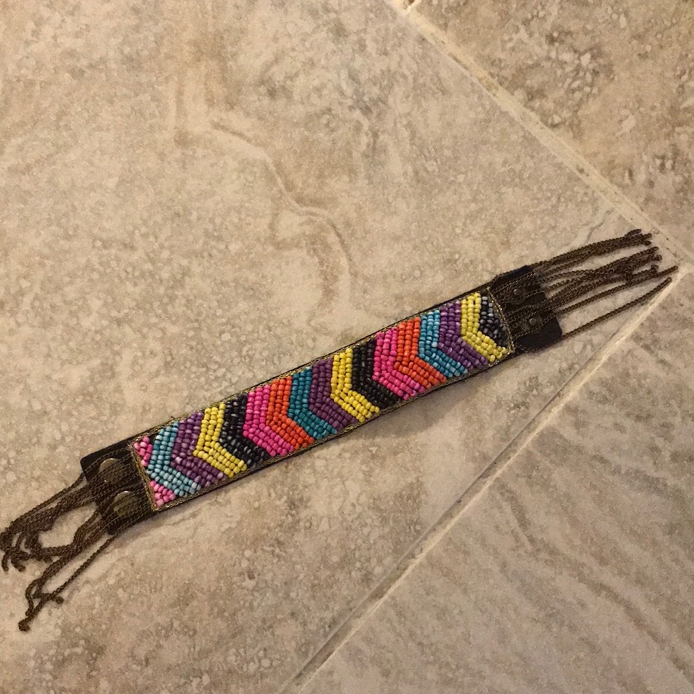 Bracelet with chains hanging down from it